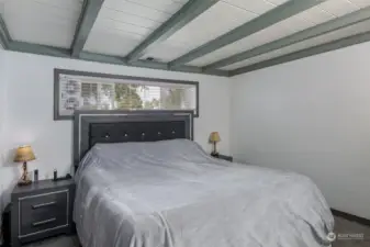 Primary bedroom with closet to the left