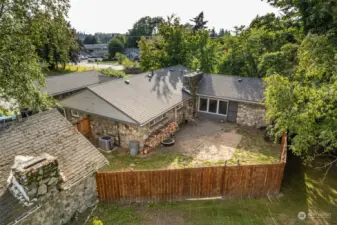 Smaller, inner fenced yard has access from both the outer yard and the living room.  Cabin on the left.  Brand new AC unit too!