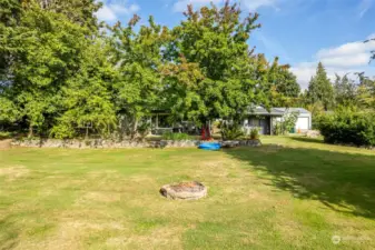 The trees provide privacy and shade for the home