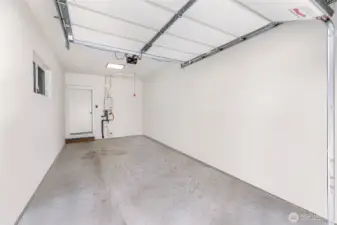 Large single car garage with EV charging.