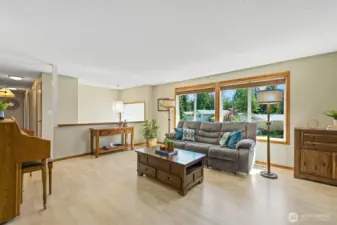 Double-paned windows, wood blinds throughout; designer new paint and light fixtures in the last year.