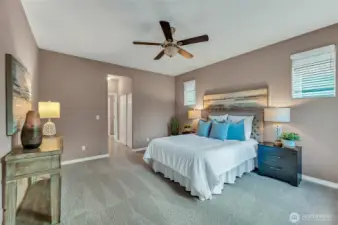 The primary bedroom is large enough for a king size bed and full sized furniture.