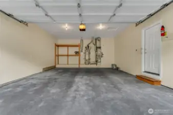 Two car garage is nice sized and enters directly into the home.