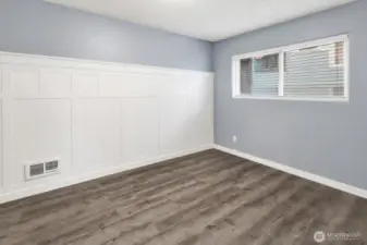Bedroom with custom wainscoting