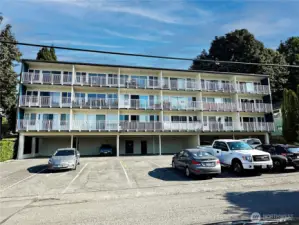 Back of building and parking lot