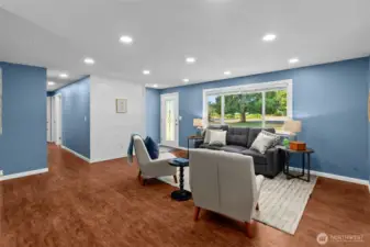 Seamless flow from the entryway into the heart of the home.