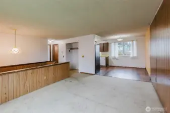 Imaging taking out the wall between the living room and kitchen to create an open concept floorplan!