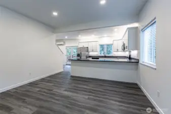 Living room looking into kitchen