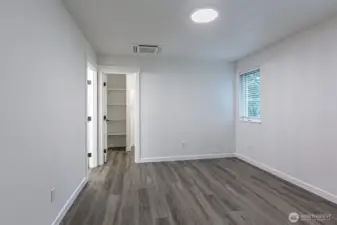 Master bedroom with walk in closet