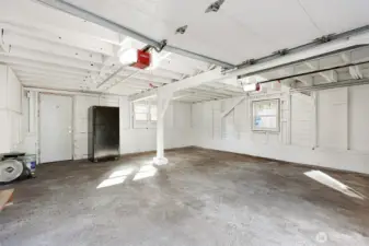 550 sq ft 2 car attached garage with shop lights!