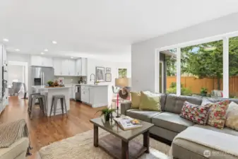 Great room concept creating an open and seamless feel between the kitchen, breakfast nook and family room perfect for gatherings.