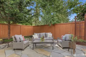 Relax on the beautiful flagstone patio, perfect for peaceful evenings and family & friend get-togethers.