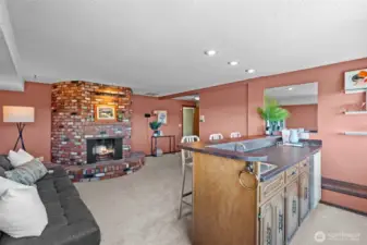 bonus room on lower level with wet bar and fireplace