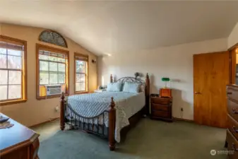 Large primary suite with lots of natural light.