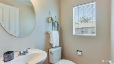Convenient half bath just steps from the living space.