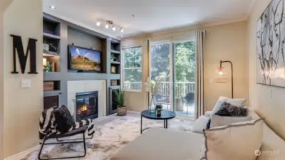 You will love a cozy night in curled up around the gas fireplace with beautiful built-ins and direct access to the balcony.