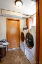 Laundry room with door to the garage