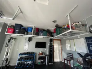 Overhead storage in garage stays.