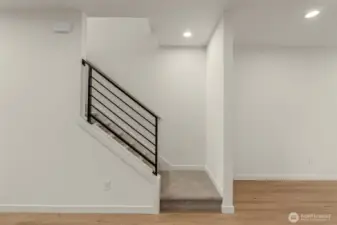 Let’s talk transitions. These stairs aren’t just stairs—they’re your runway to the rest of the home.