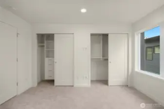 Double closets = double the possibilities. Built-ins are on one side, and open storage is on the other. It’s a wardrobe wonderland.