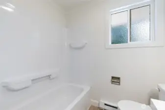 Bath tub with linen closet
