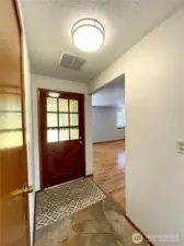 Front door entryway with access to the huge living room.