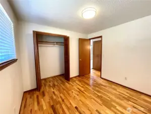 2nd bedroom, directly across the hall from the full bathroom