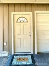 Carport entrance into garage.