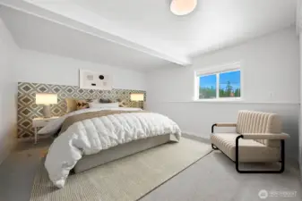 Virtual staging of the downstairs master bedroom