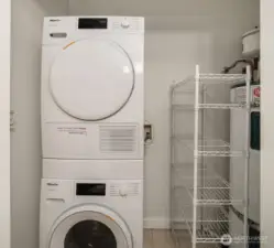 Miele washer and dryer in the bathroom.