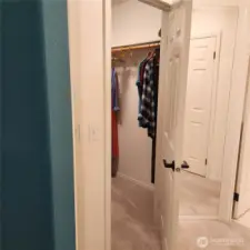 Entering the ensuite there is dual walk in closets