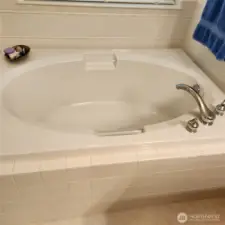A nice deep tub! (Don't forget this home has on demand hot water)