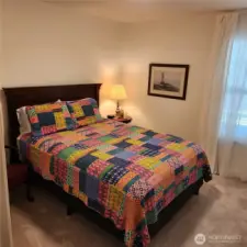 The second bedroom fits a queen size bed.