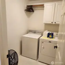 An indoor utility room means no going out to the garage in the cold!