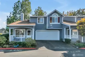 Amazing end unit townhome with garage and private yard.