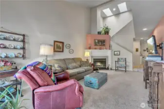 Soaring vaulted ceilings and natural light with skylights.