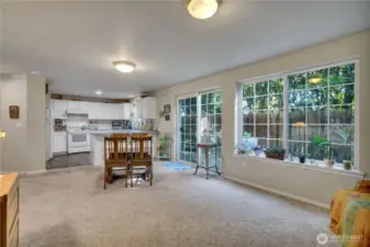 Open concept kitchen to second living room.