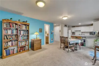 Space for a dining room table as well as bar stools at the kitchen peninsula.