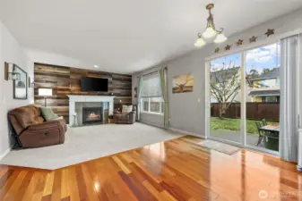 Open to kitchen and nook, this is the space where family and friends come together. Natural light abounds with the tall windows and large slider.