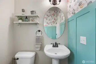 Board and batten detailing with wallpaper touches add whimsy and style, even in unexpected places!