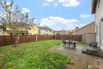 Fully fenced with gate on side.