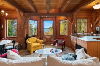 Open great room is cozy yet spacious. Windows provide so much light and beautiful views.