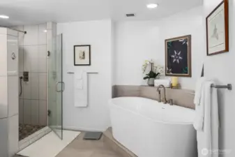 Updated en-suite bath with modern finishes and clean design.