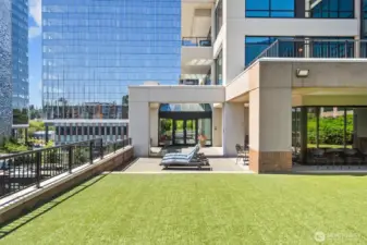 Downtown Bellevue condo building with secured entry and guest parking.