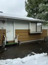 Side door, and living room window.