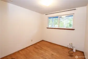 First bedroom. Hard wood floors.