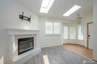 Skylights bring in natural light, making the home feel even brighter and more spacious.