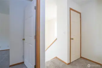 Upper level landing includes a handy closet for extra storage.
