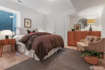 Fifth bedroom down offers more handy built-in storage.