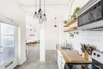 Entire unit was recently renovated with polished concrete floors, subway tile, new light fixtures